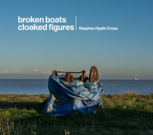 Broken boats cloaked figures